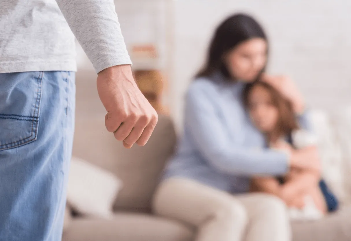 Man holding up fist in front of scared mom and daughter. If you’ve suffered domestic violence during your marriage, our aggressive female divorce lawyers are ready to fight for your safety and protection.