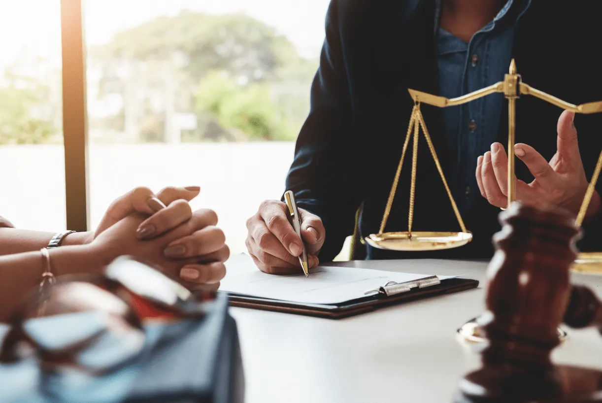 A female divorce lawyer in Columbus Ohio consulting a female client who needs assistance building an aggressive case against her husband. Our team of experienced lawyers is here to support you in your fight for a fair settlement.