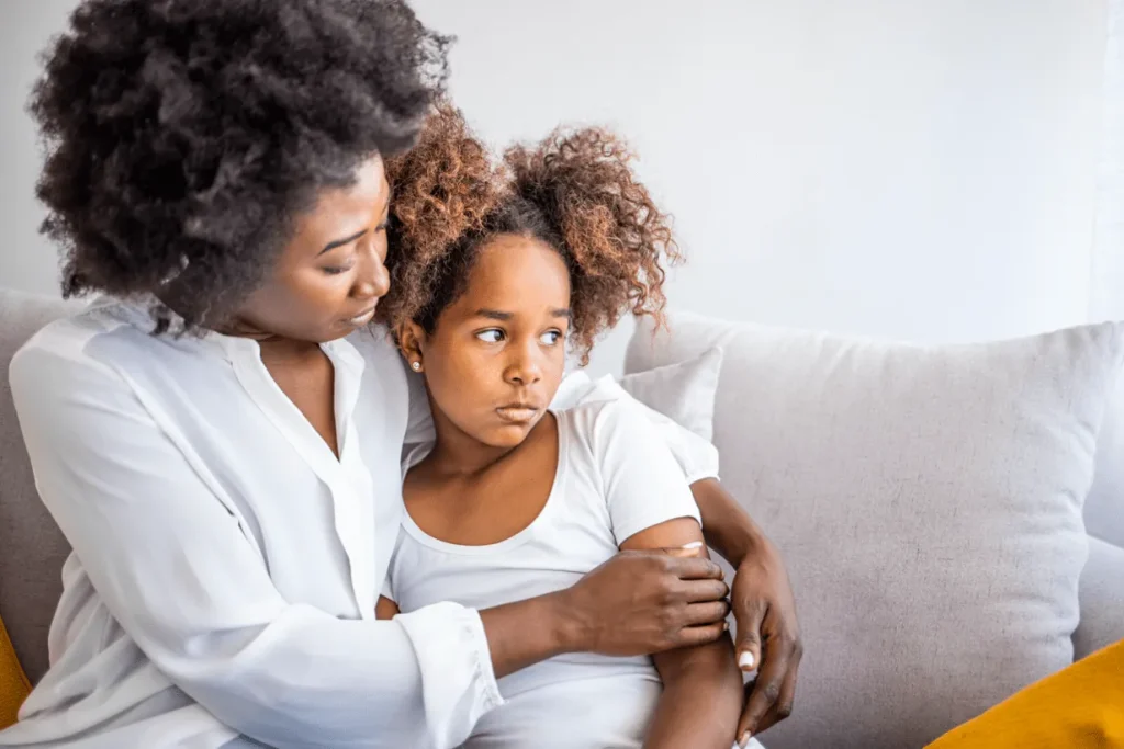 A woman sitting on her couch hugging her daughter with a concerned look on her face. Our divorce attorney for women’s rights knows it can be an uphill battle fighting for custody over a child and putting their needs first. Our women divorce attorneys can help you approach the legal proceedings with clarity and confidence.