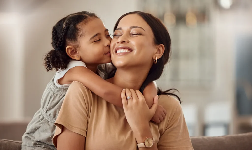 A mom and a daughter together.