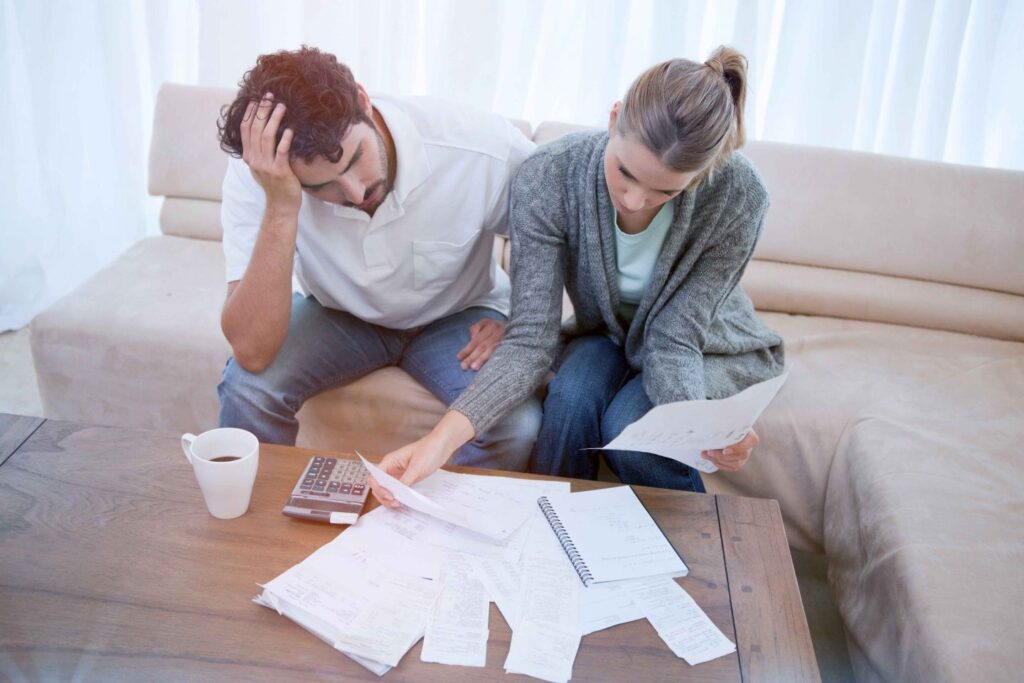 A couple looking over financial documents.