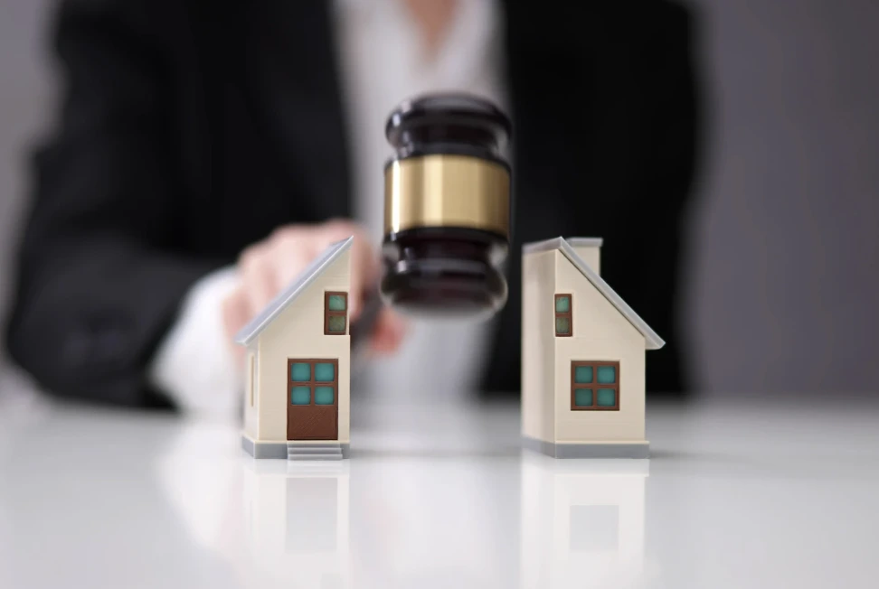 lawyer indicating a legal decision on property.