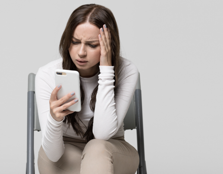 Womam reading phone messages.