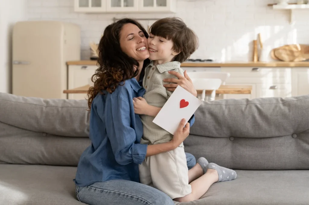 Mother and child hugging.
