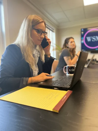 Female divorce attorney calling a client